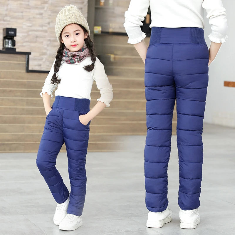 Navy quilted children’s trousers with an elastic high waist
